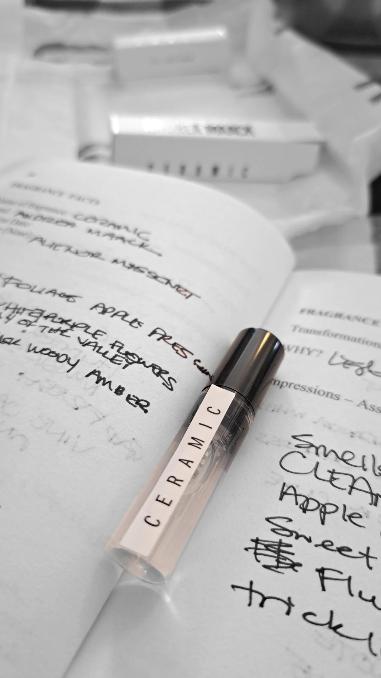 Andrea Maack Ceramic perfume sample on a fragrance notebook with notes written in black ink.