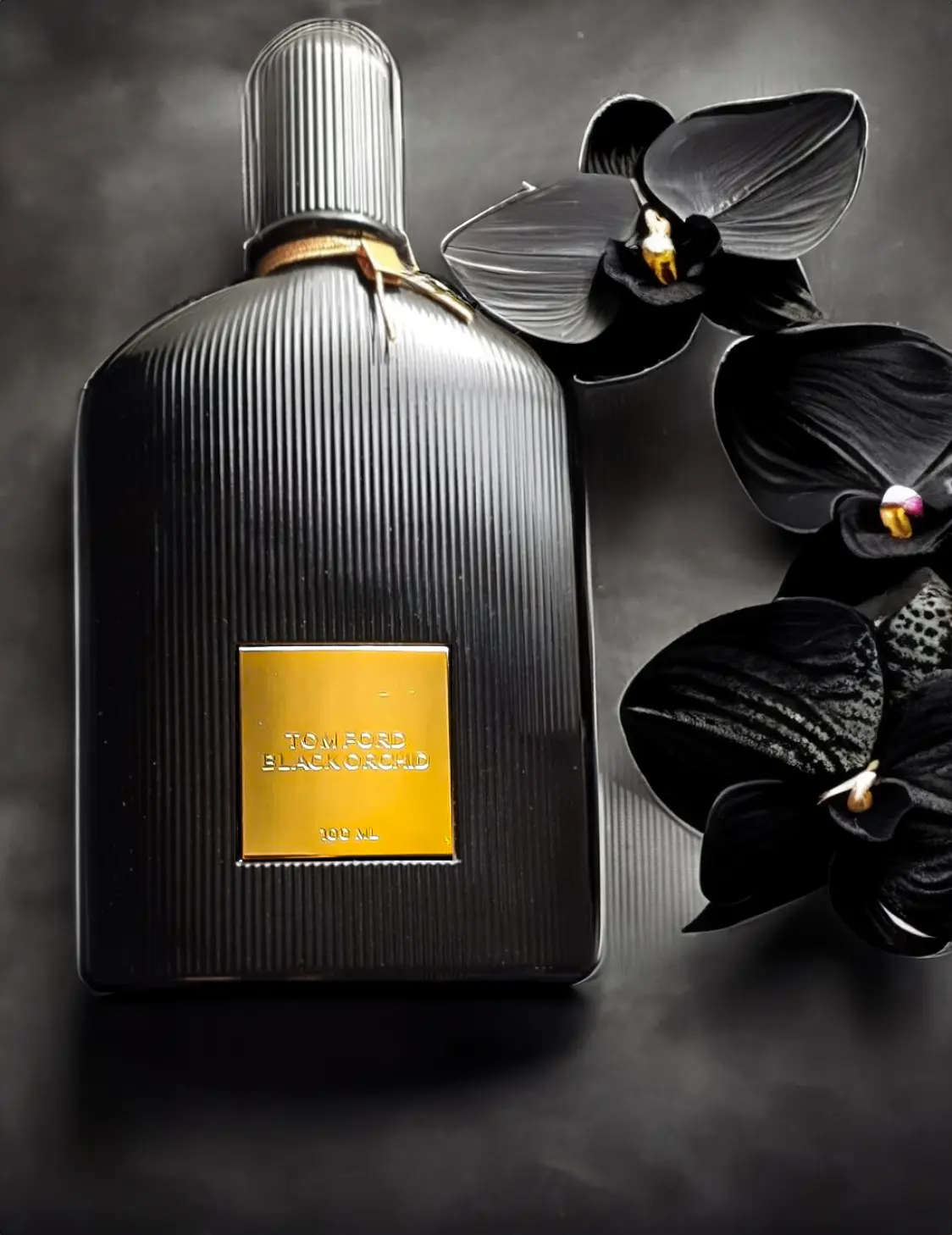 Close-up of the golden label on Tom Ford Black Orchid perfume bottle reflecting a luxurious interior