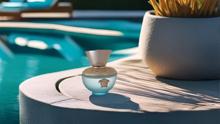 Versace Dylan Turquoise perfume bottle poolside.